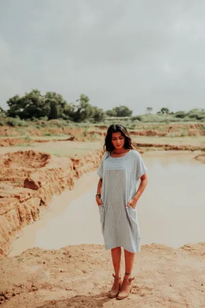 Boat-Neck Dress with a Pleated back.